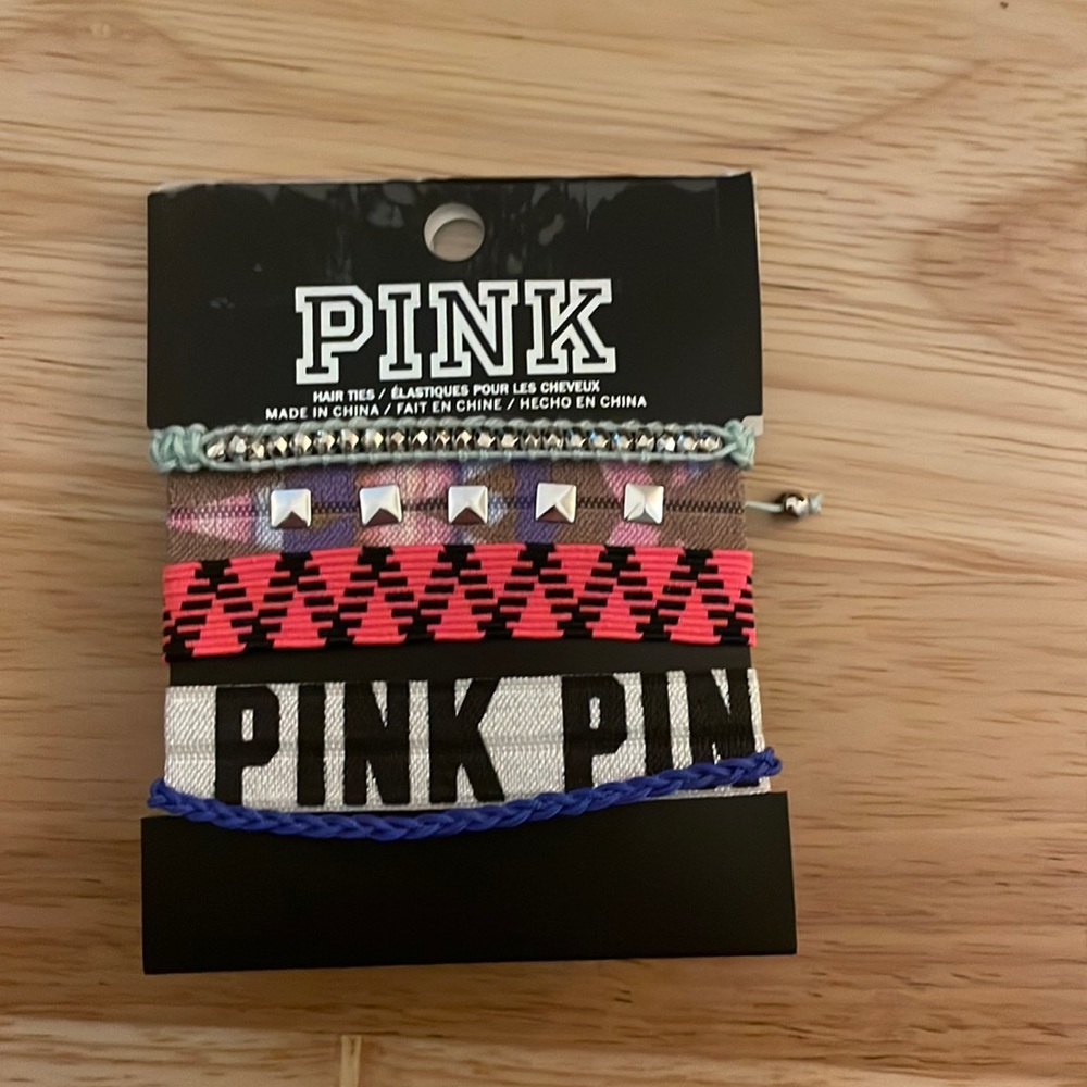 Victoria’s Secret Pink hair ties and bracelets